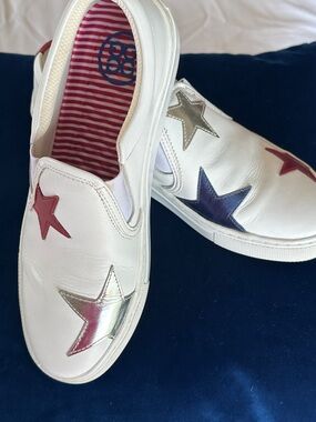 G/FORE White Slip-On Sneakers with Red, Silver & Navy Star . Runs small